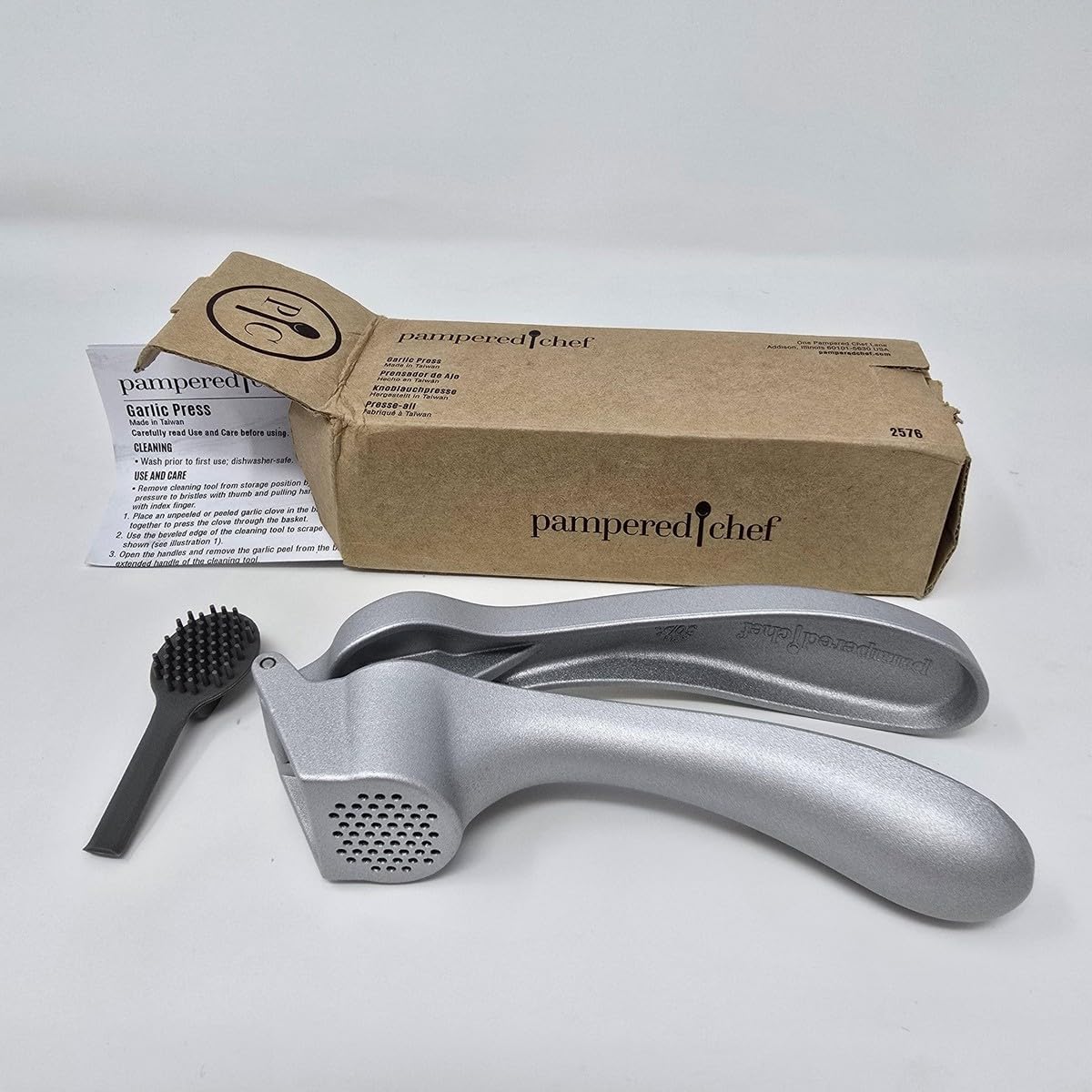 The New Improved Garlic Press